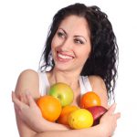 Woman Hugging and bundle of fruit